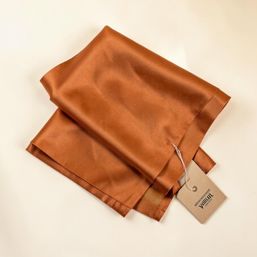 Printed silk scarf laid flat